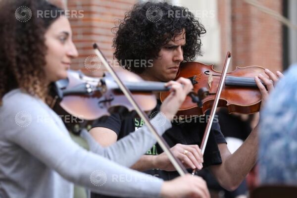 Musicians of Palestine youth orchestra meet on tour concert in Amsterdam Musicians of Palestinian youth orchestra, who can't rehearse and play in their own land, play their instruments at the Amsterdam Museum Netherlands August 14, 2019. REUTERS/Eva Plevier
